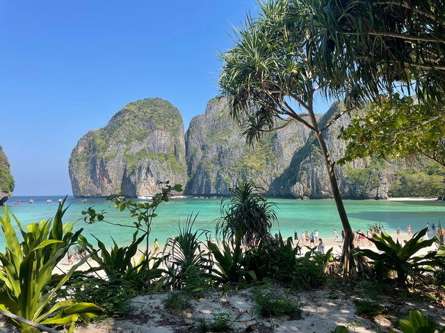 Scenic beach with turquoise water and cliffs