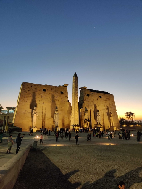       Luxor Temple with sunset sky in the background.
  