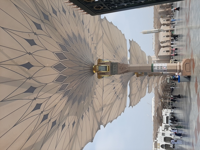       Architectural canopy with people
  