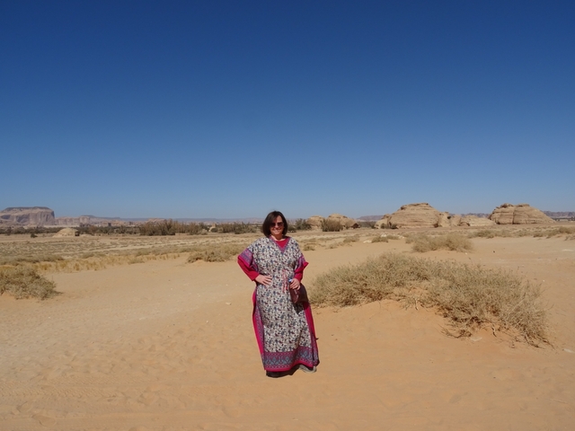       Woman in desert landscape
  