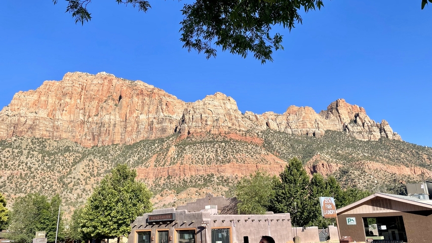 Distant mountain range with clear blue sky.