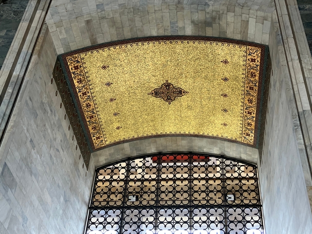       Ornate ceiling with golden mosaic.
  