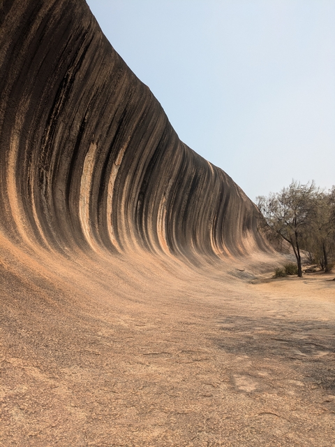 Natural rock formation resembling ocean waves.