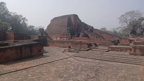 Ancient brick ruins with steps and platforms.