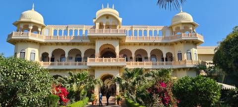 Impressive historical building with arches and domes.