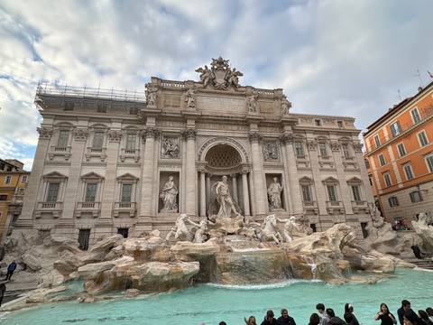       Trevi Fountain with sculptures in Rome.
  