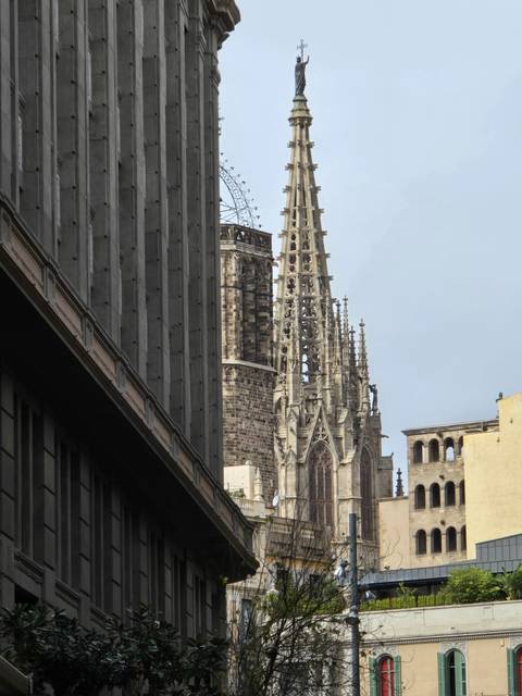 Gothic style cathedral spire visible from a street.
