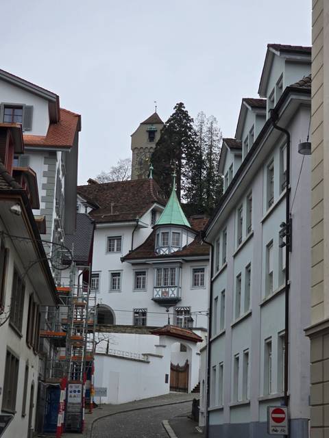 Charming European street with historical buildings.