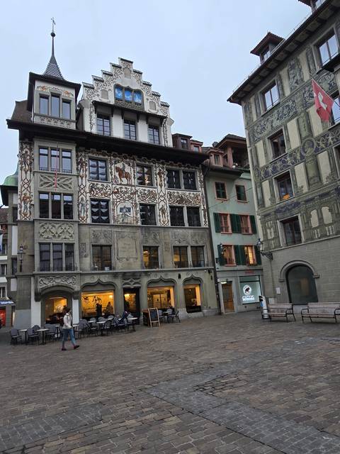       Decorated facade of a building in Zurich.
  
