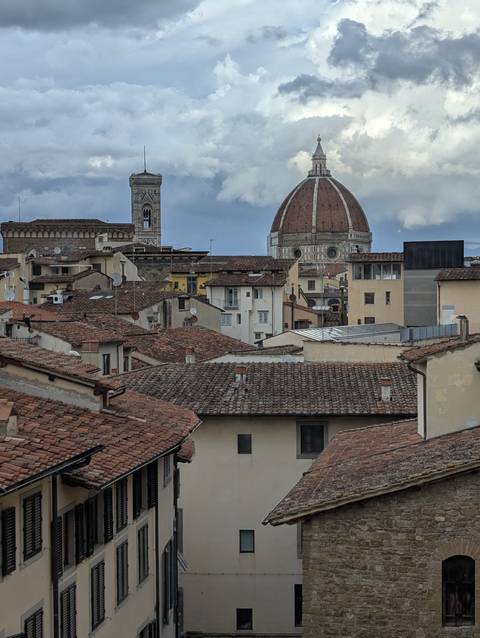       Cityscape with a prominent cathedral dome.
  