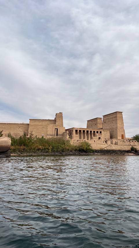 Ancient Egyptian temple by the river.