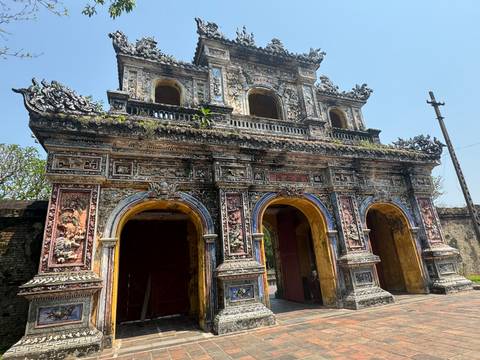       Ornate gateway of a historical site with intricate designs.
  