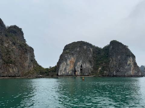       Halong Bay with limestone formations and clear waters.
  