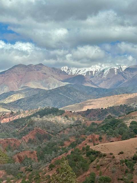 Scenic view of the Atlas Mountains with snow-capped peaks.