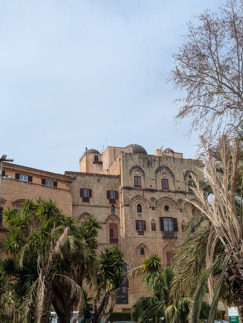 Old building with architectural details and a dome on top.