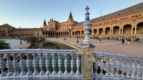       Plaza de España in Seville with intricate tile work.
  