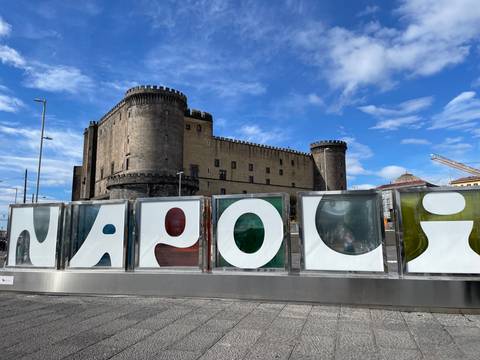 Impressive castle with the word 'NAPOLI' in front.