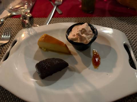 Dessert plate with small portions of various sweets.