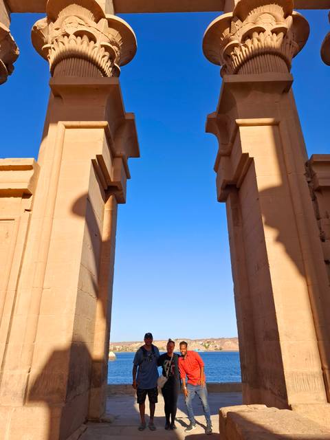 Ancient stone columns under blue sky