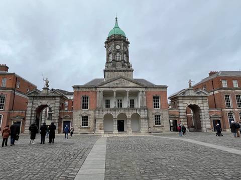 Exterior of a historic building with a clock tower.