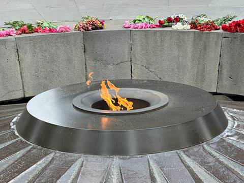       Eternal flame surrounded by a stone structure.
  