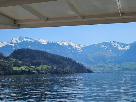 Scenic view of a lake with mountains in the background.