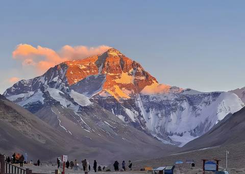       Majestic view of Mount Everest at sunset.
  