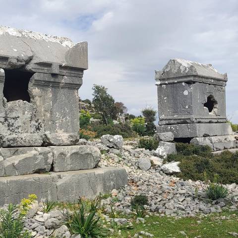Ancient stone ruins in a rocky landscape.