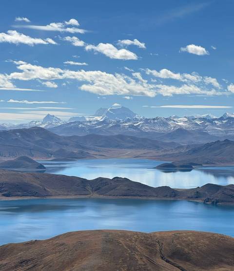 A stunning view of mountains and a lake.