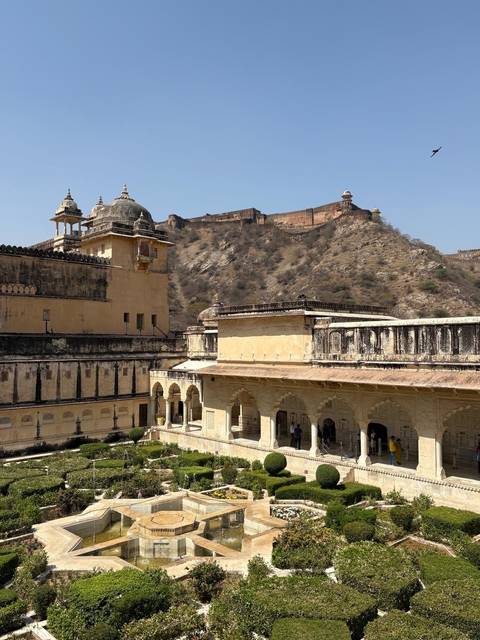 Historic fort and palace in a hilly area.