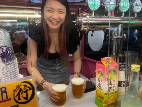       Bartender serving drinks with a bright smile.
  