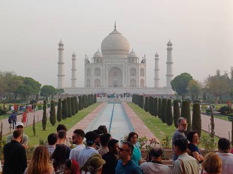 Taj Mahal crowded with tourists.
