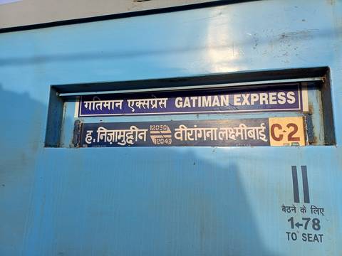 Train station sign for Gatiman Express.