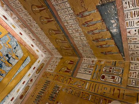       Colorful ancient Egyptian wall paintings.
  