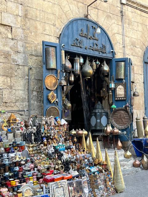 Market stall with various traditional items on display.
