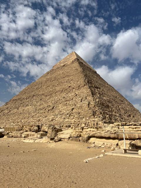       Great Pyramid of Giza under a clear sky.
  