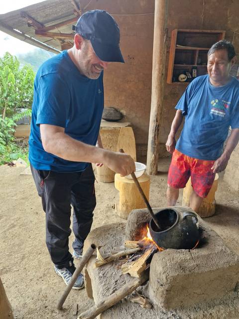 Person interacting with local culture activities.