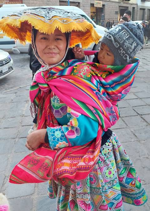       Person wearing colorful traditional clothing
  