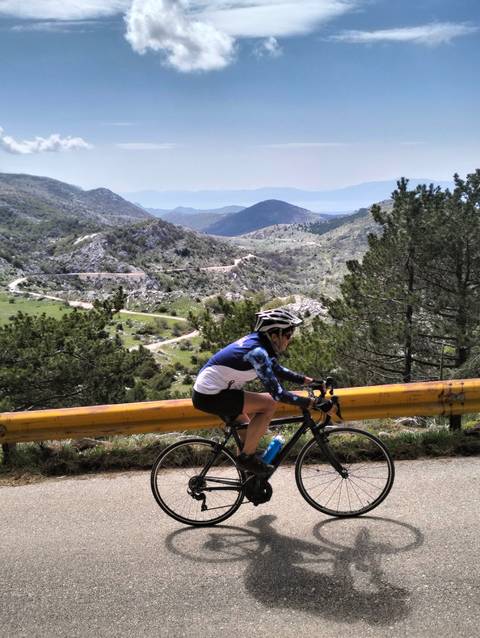       Cyclist on a mountain road
  