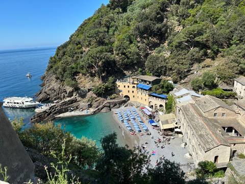 A picturesque coastal village with clear blue water.