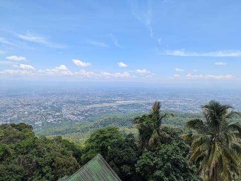 Scenic view of a city and landscape from an elevated perspective.