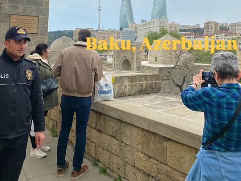 Photo with large overlay text displaying 'Baku, Azerbaijan'.