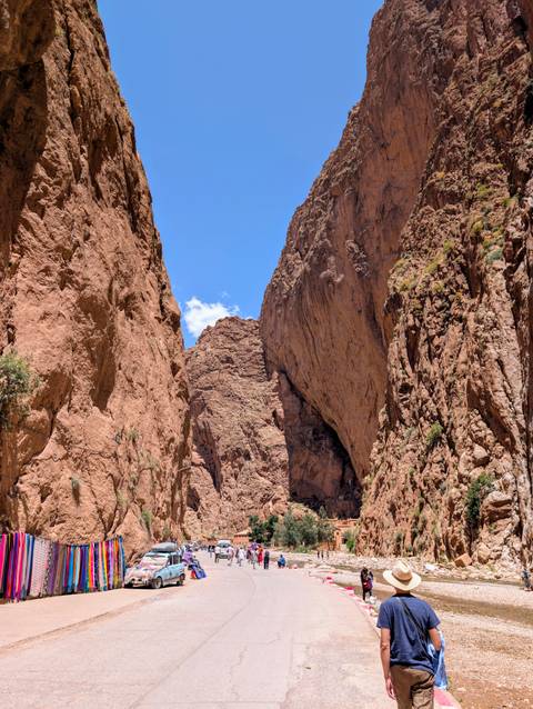 Dramatic canyon with steep rocky walls.