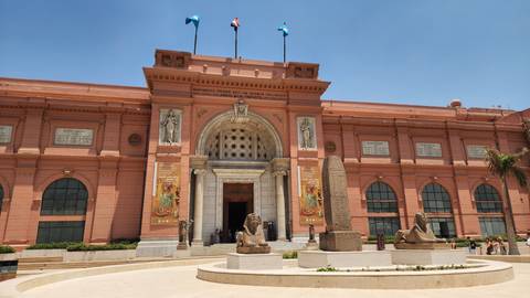 The Egyptian Museum facade with Sphinx statues.