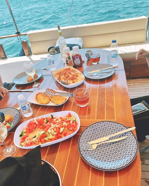 Dining table with a meal setup outdoors.