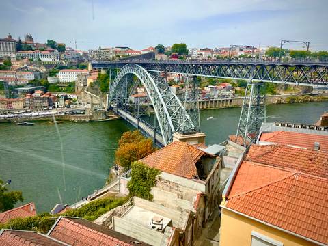       The Dom Luís I Bridge crossing the Douro River in Porto.
  