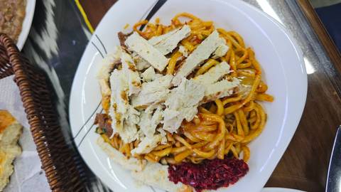       Hearty traditional dish with noodles and meat.
  