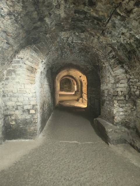 Interior view of an ancient stone passageway.