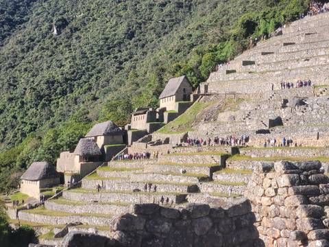       Terrace farming with ancient stone structures.
  