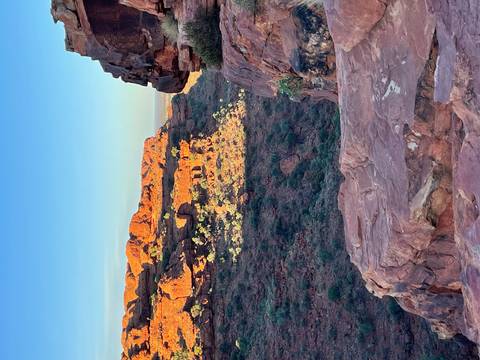       Rocky canyon landscape with clear blue sky.
  